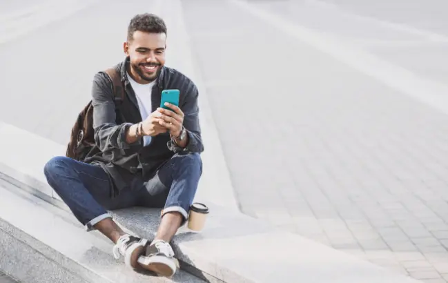Guy using the phone Section Image