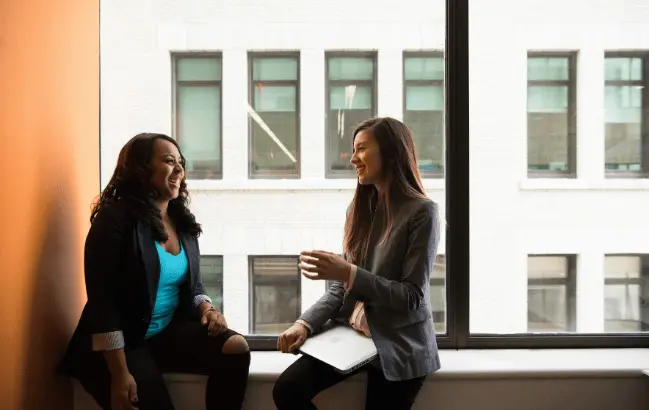 Workers talking with each other section image